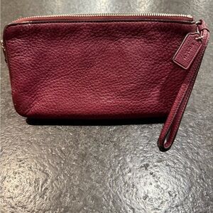Coach Pebbled Leather Wristlet in Deep Wine